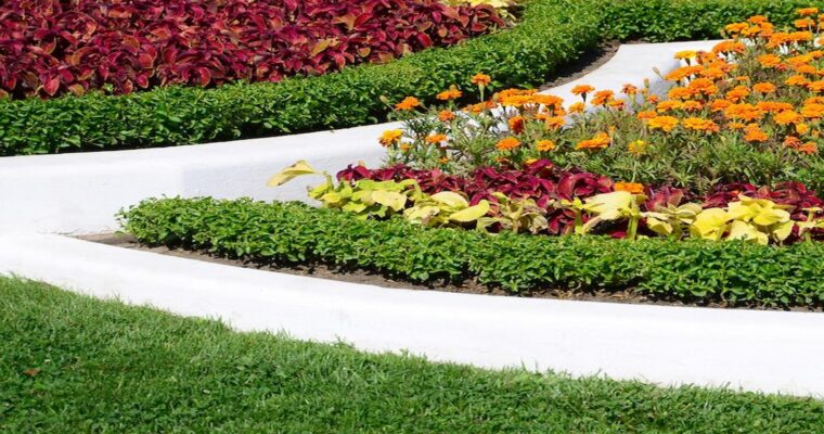 Blending Artificial Grass With Natural Flower Beds For A Stunning Garden Oasis