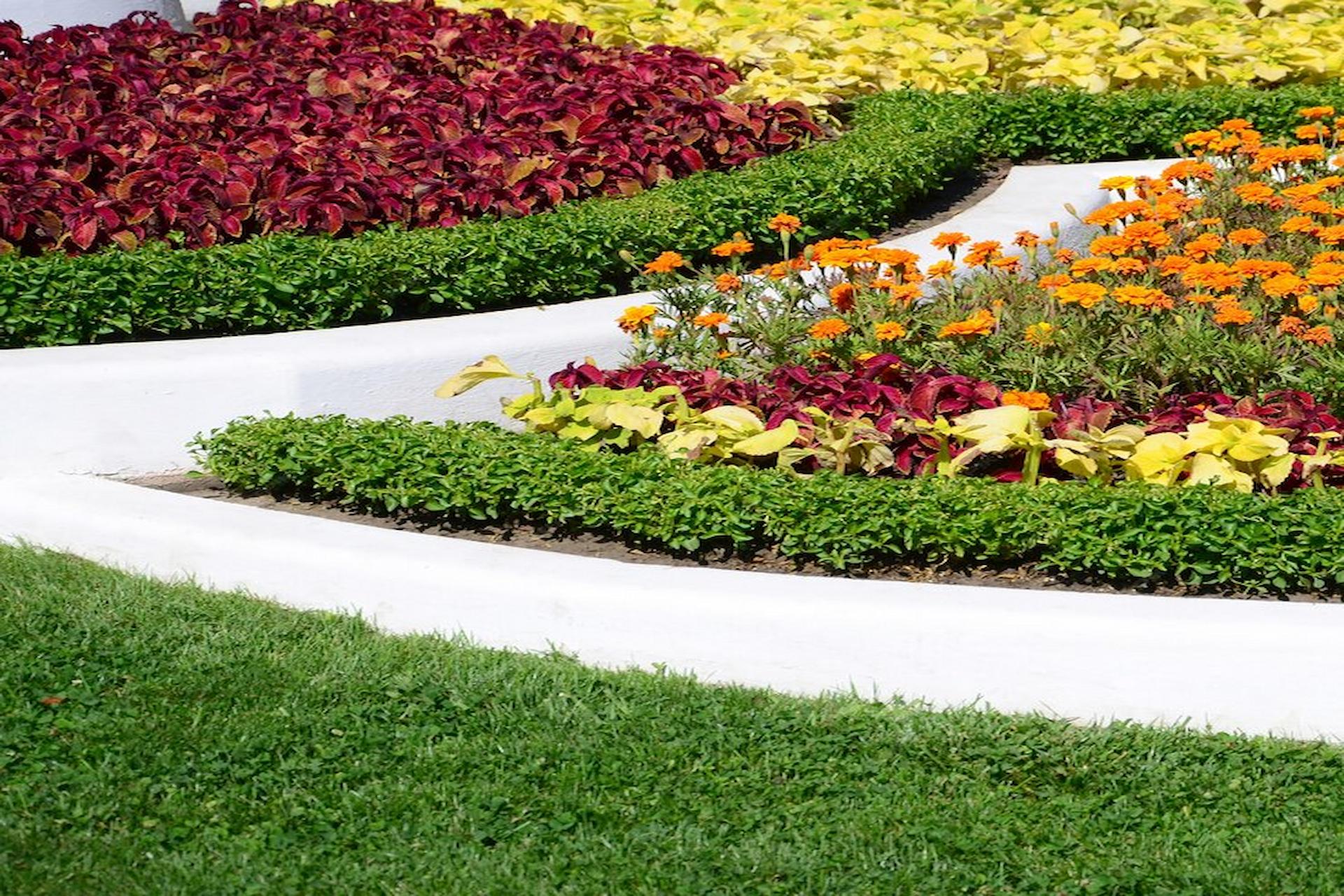 Blending Artificial Grass With Natural Flower Beds For A Stunning Garden Oasis